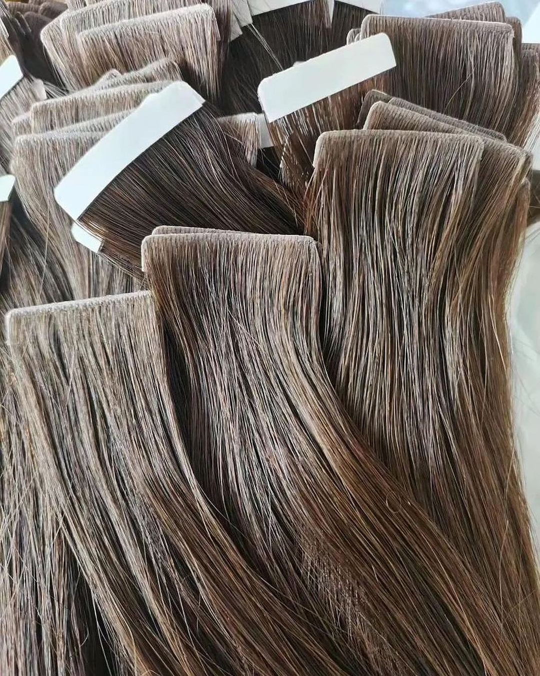 INVISIBLE TAPE IN HAIR EXTENSIONS